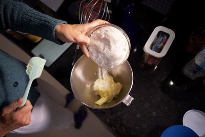 High angle view of woman preparing food