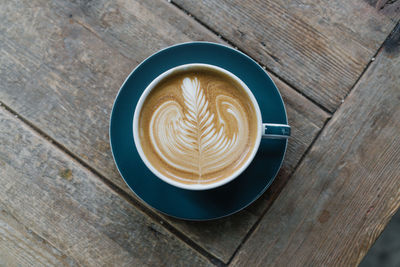 High angle view of cappuccino on table