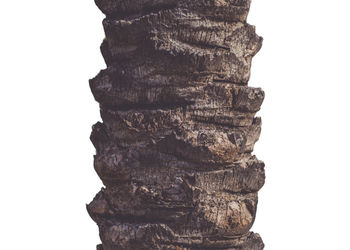 Low angle view of stack against white background