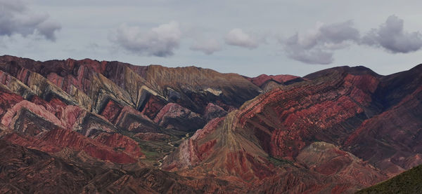 View of mountain range against cloudy sky