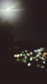 Defocused image of illuminated street lights