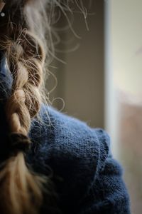 Close-up of a woman with braided hair 