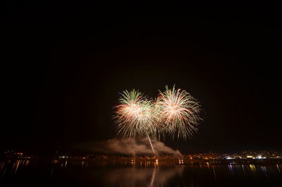 Firework display at night