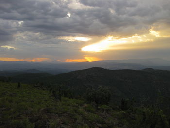 Scenic view of landscape against sky during sunset