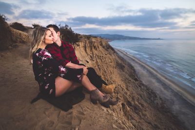 Full length of woman standing on beach