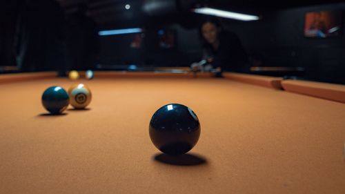 Man playing with ball on table