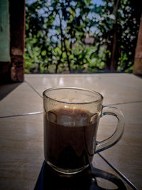 Close-up of coffee cup on table