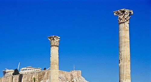 Low angle view of tower against clear blue sky