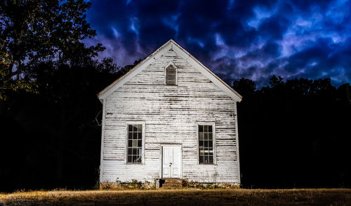 Exterior of old building against sky at night