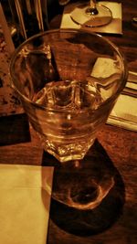 Close-up of wine glasses on table