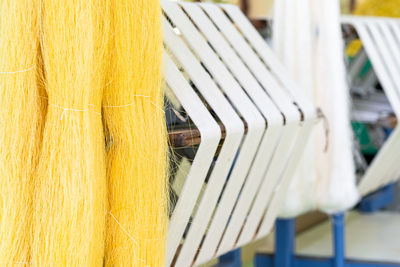 Close-up of clothes hanging on wood