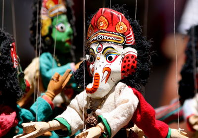 Close-up of colorful puppets