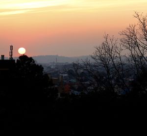 High angle view of city at sunset