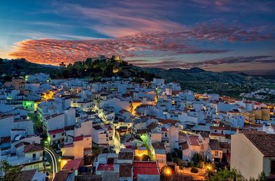 High angle view of townscape against sky at sunset