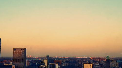 High angle view of cityscape against sky during sunset