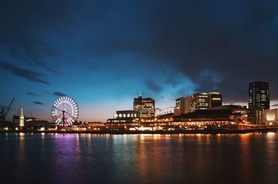 Illuminated cityscape at night