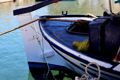 Boat moored in lake