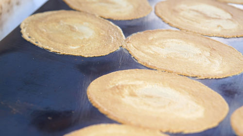 Thai street food crepe dessert with cream and sweet paste