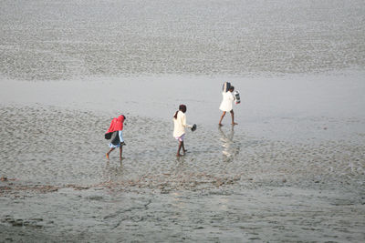 People walking at matla riverbank