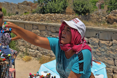 Portrait of woman holding umbrella