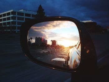 Reflection of sky on side-view mirror