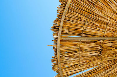 Low angle view of building against blue sky