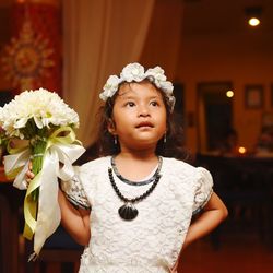 Close-up of girl holding flowers