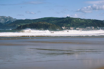 Scenic view of beach against sky