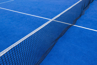 Service line and the net of a paddle tennis court