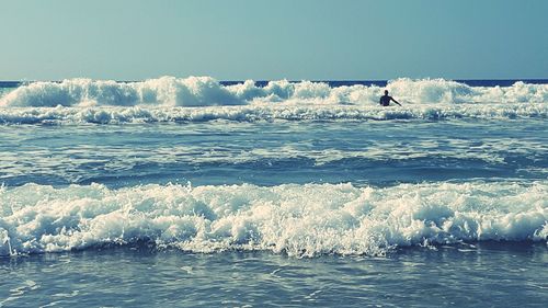 Scenic view of sea against clear sky