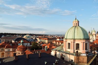 View of buildings in city against sky