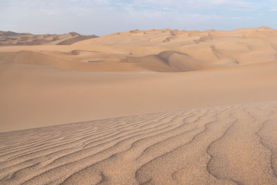 Scenic view of desert against sky