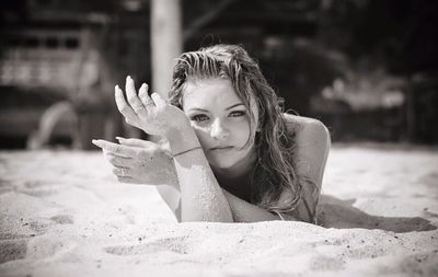 Low angle view of girl on sand