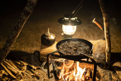 High angle view of candles on barbecue grill