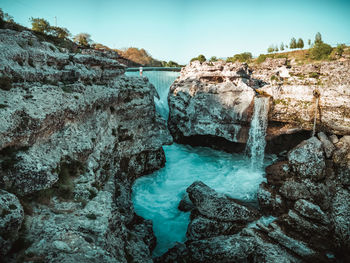 Waterfall against sky