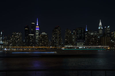 Illuminated city lit up at night