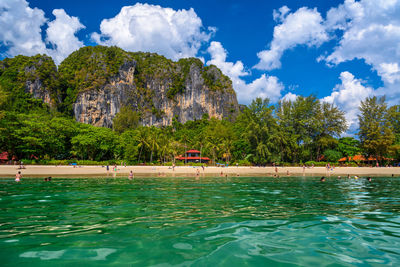 Scenic view of swimming pool by sea against sky