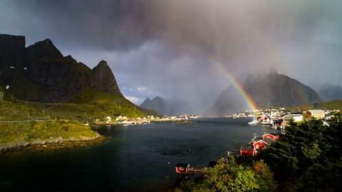 The rain is coming with a rainbow near the village of reine, lofoto islands 
