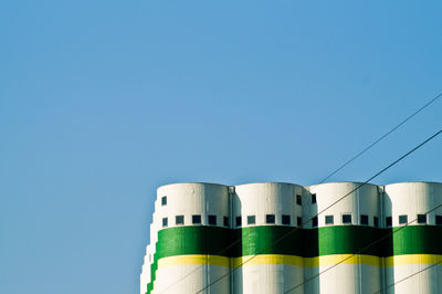 Low angle view of built structure against blue sky