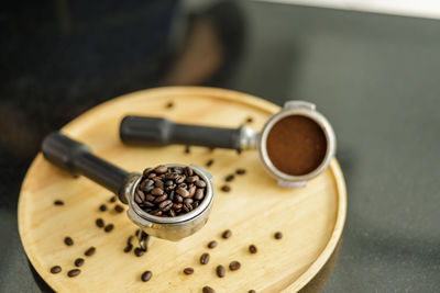 Coffee ground in portafilter for espresso in cafe