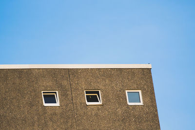 Low angle view of building against clear sky