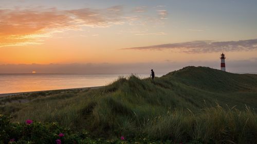 Scenic view of sea against sky during sunset
