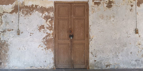 Closed door of old building