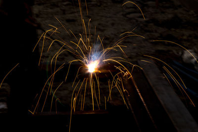 Close-up of firework display at night