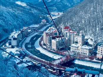 High angle view of city buildings during winter