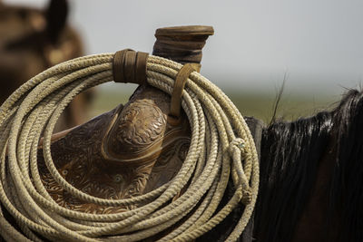 Close-up of rope tied on metal