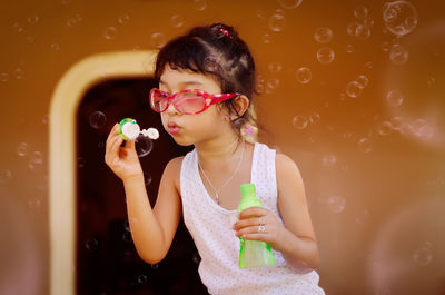 Full length portrait of a woman drinking water