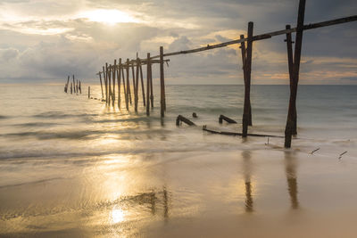 Scenic view of sea against sky at sunset