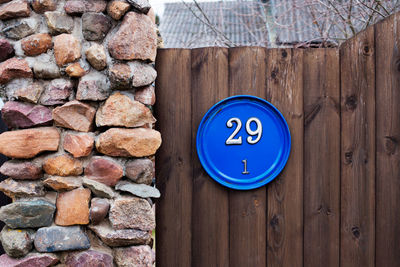 Close-up of sign on wall