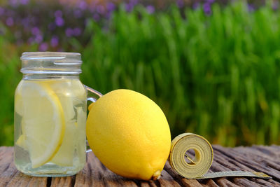 Close-up of drink in glass jar on table